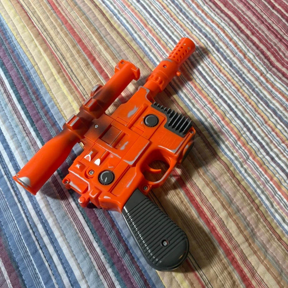 Disney Star Tours Star Wars Han Solo DL-44 Blaster Toy Orange Silver Weathered